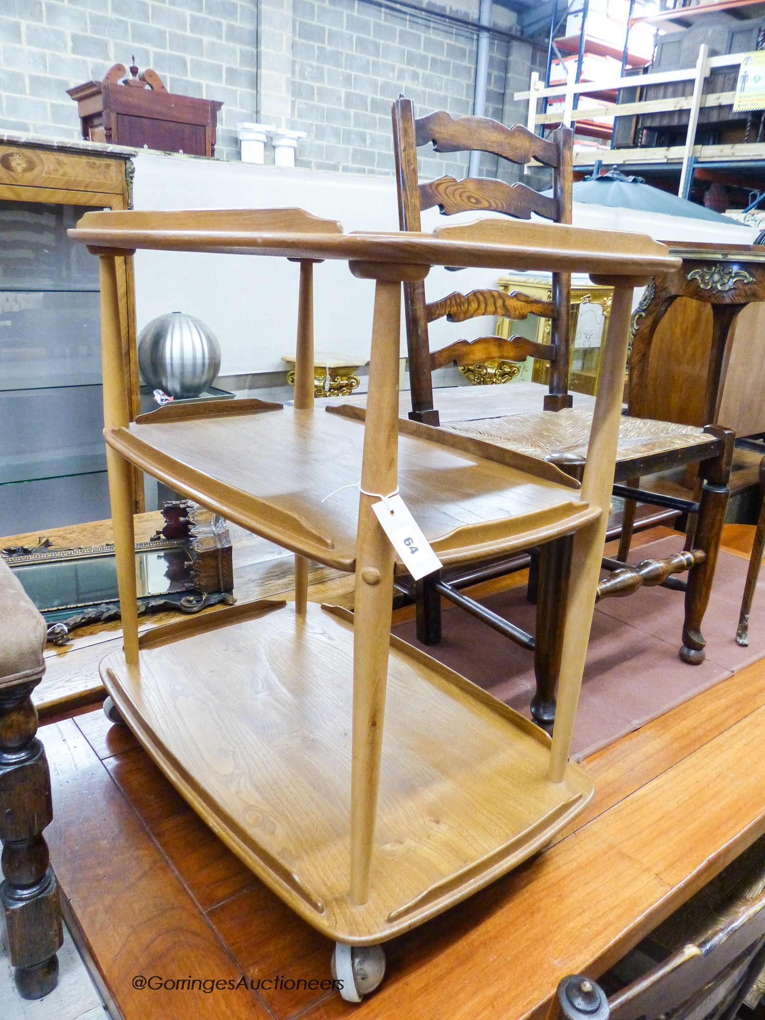 An Ercol light elm and beech three tier trolley, length 72cm, width 46cm, height 77cm